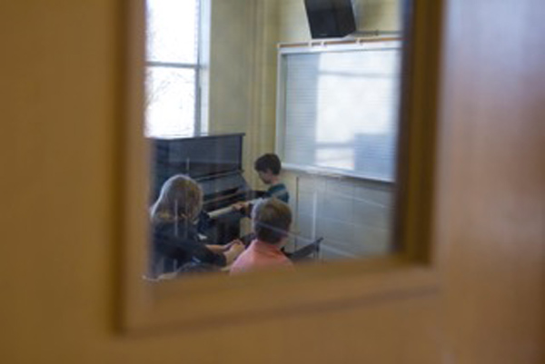 looking through a window at a class being held